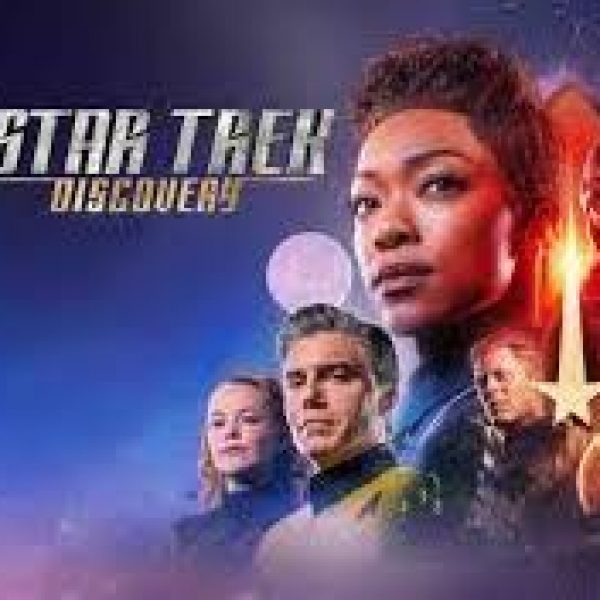 Star Trek Discovery with characters faces and a falling star emblem