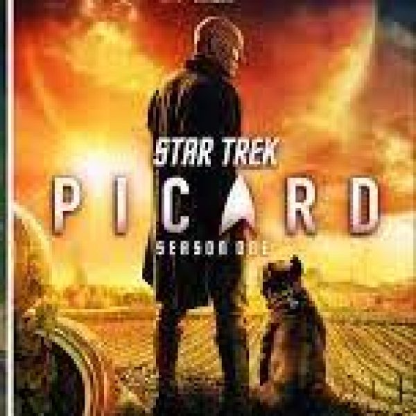 Star Trek Picard CBS All Access. Jean Luc looks down at a dog, in front of a vineyard, lit by a vast sunset